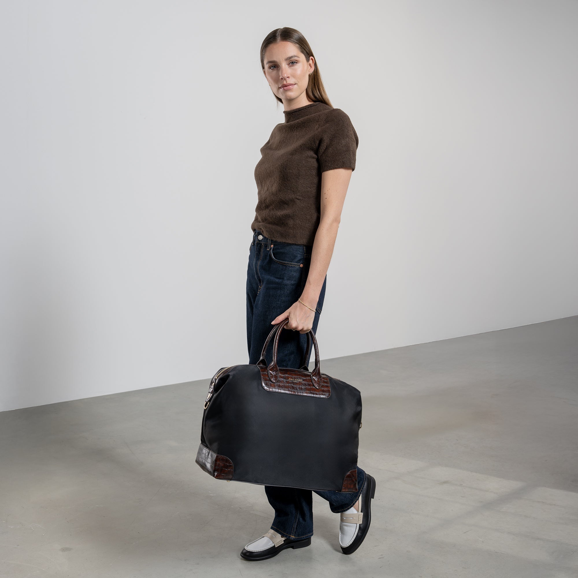 Cadeau d'Isabel black back pack and weekend bag small