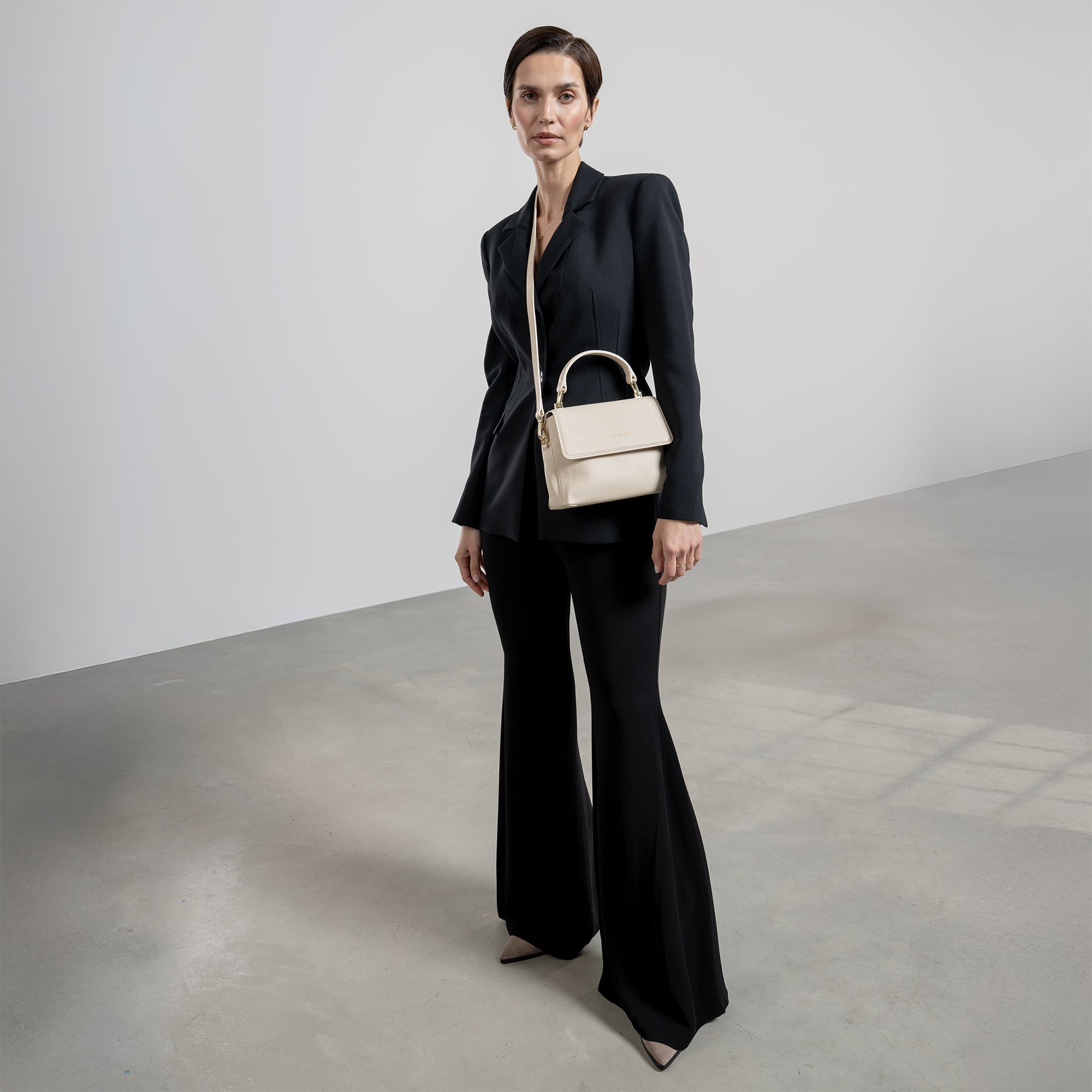 Femme Forte Heline cream calfskin leather handbag